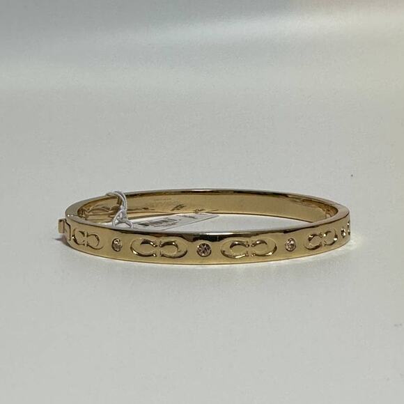 Coach Gold tone Kissing C Hinged Bangle Bracelet - Picture 5 of 9